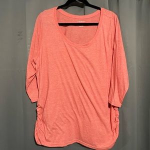 Coral pink ruched sided 3/4 length sleeve top.